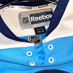 Reebok Pittsburgh Penguins Blue Premier Jersey missing sting for top